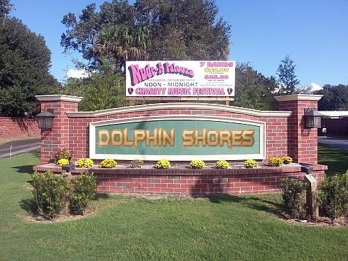 Sign proclaiming ‘Dolphin Shores’