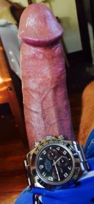 A long hard cock with a watch on its base