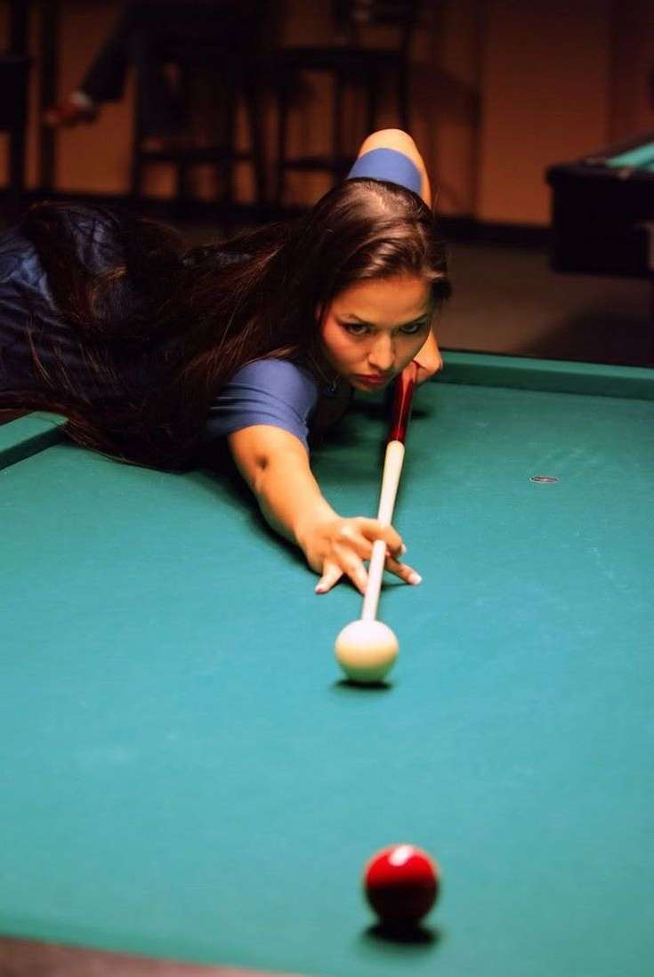 Brunette Woman playing pool