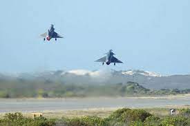 Image of two fighter jets taking off