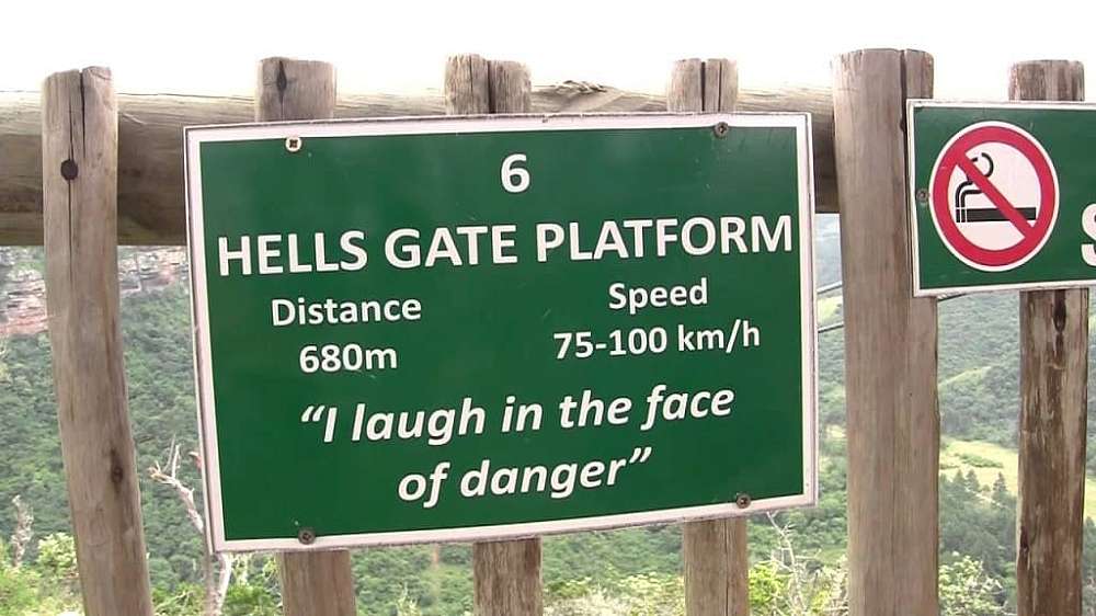 Sign with info and a quote ‘I laugh in the face of danger’
