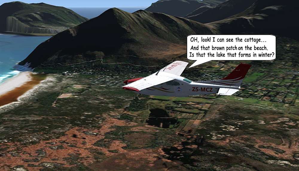 The red and white Cessna T210M, with Roy in the pilot seat and Fiona in the Right seat, cruise across the Silvermine Valley with Noordhoek beach slightly on the nose of the aircraft. Sacred Mountain, is seen hugging the coast with Chapman’s Peak Drive climbing along the southern slopes of the mountain. Fiona spots the cottage and the winter formed lake on the beach.