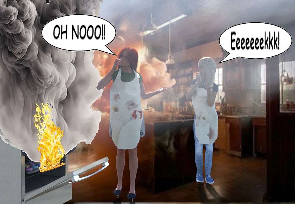 Two women stand in a smoke-filled kitchen, both wearing aprons spattered with flour and batter. The oven is open, flames and thick black smoke billowing from inside. One woman, Angie, with red hair and a green shirt, gestures in exasperation while holding a phone to her ear. The other, Fiona, with long blonde hair and jeans, looks embarrassed, her hand half-covering her mouth. Behind them, the scene is a mess — scorched counters, haze from the fire, and what appears to be an explosion mid-blast. They look like they meant well ... but baking clearly wasn’t their strong suit.