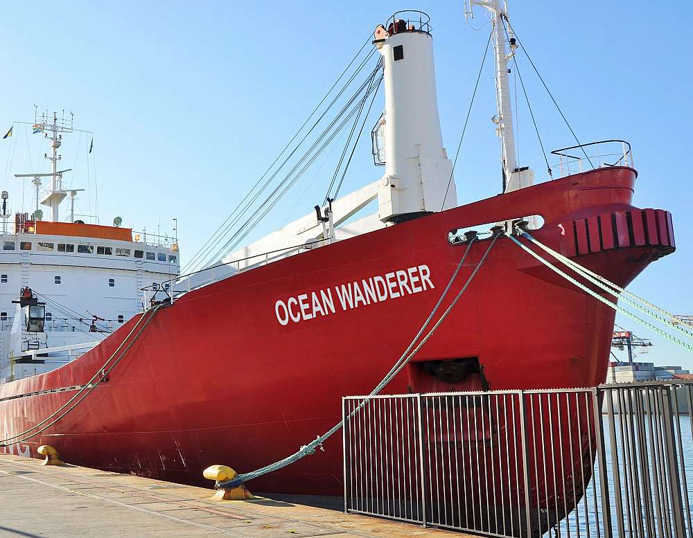 Seen docked in the port of Cape Town, the Ocean Wanderer with her red hall and white superstructure is waiting to get underway.