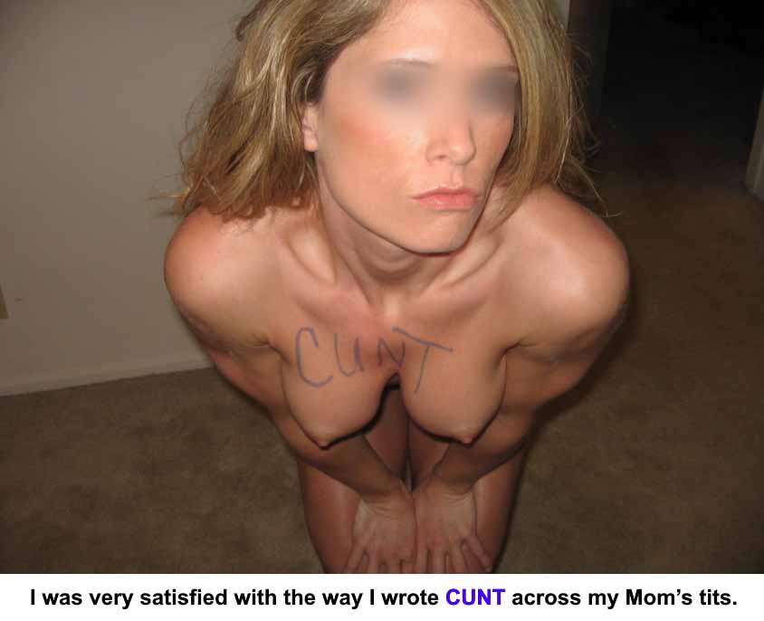 Naked woman with the word ‘cunt’ written over her chest