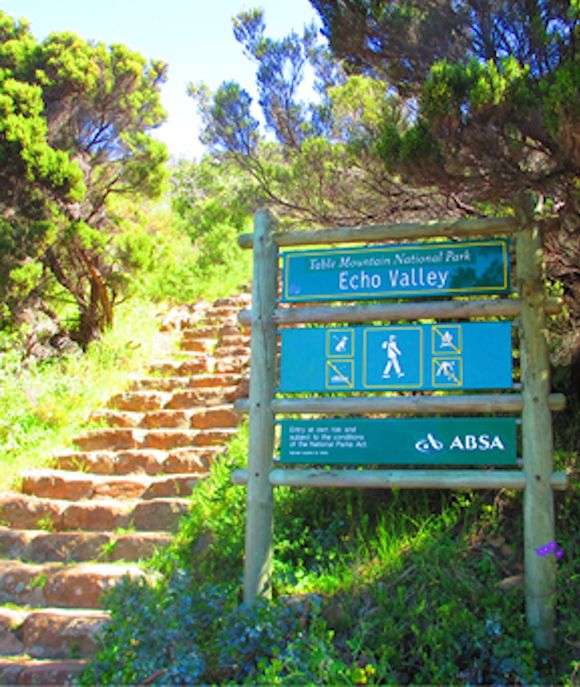 The start to the hiking trail that would take the crew along the Echo Valley path towards Oread Halls cave. The picture show the sign board with the name of the route. In the background just past the sign board one can see the steep incline of the route.
