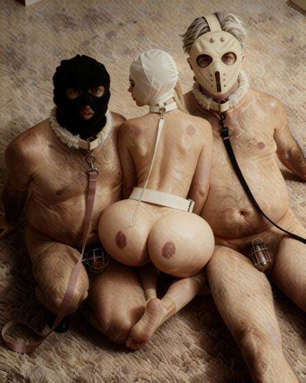 A group of naked people wearing masks