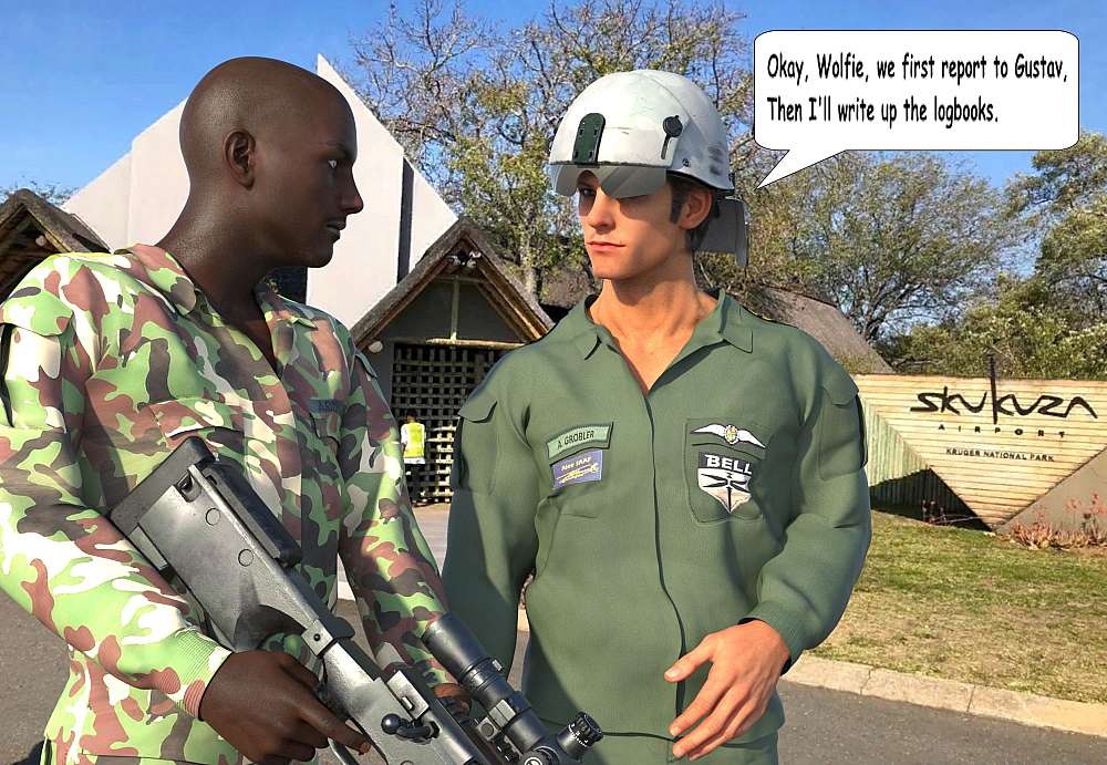 Wolfie and Adrian walk towards the SANparks offices across the apron past the Skukuza Airport Terminal. The decorative signboard reads in a bushveld inspired script ‘Skukuza.’ The Thatch roofs of the airport building is not visible from this angle.