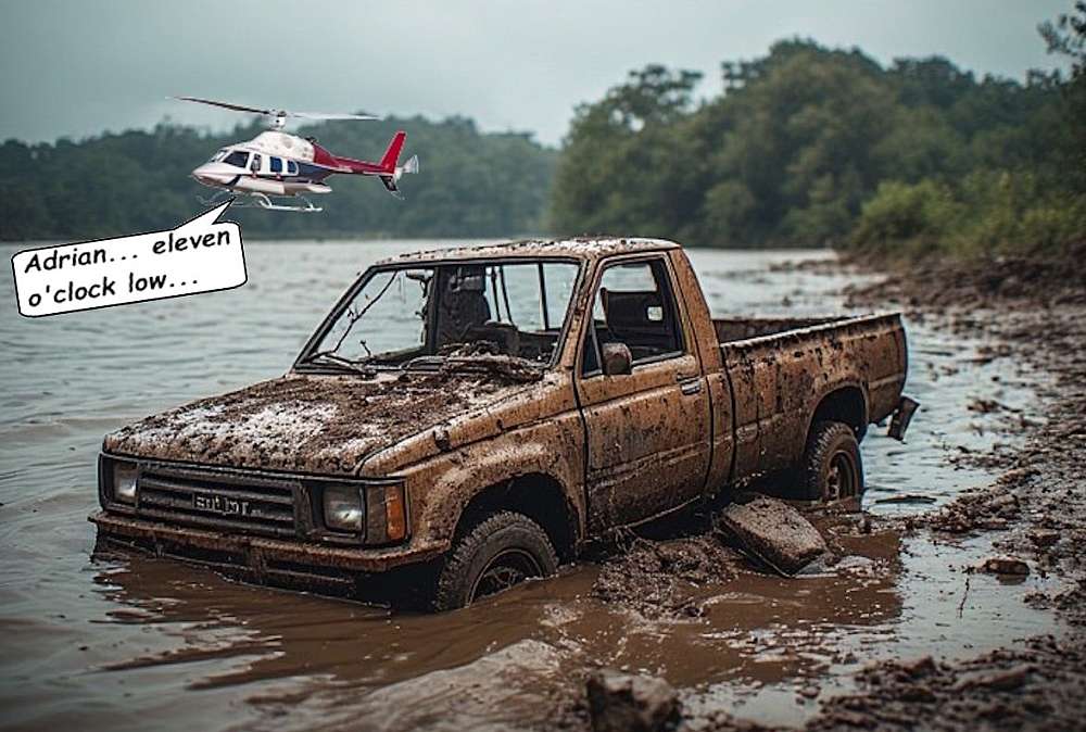 Adrian and Wolfie fly along the Sabi River and just as they come around the bend in the Sabi, after the confluence with the Sand River, Wolfie spots the washed up bakkie on the south bank of the Sabie river. The river still runs high but the bakkie is washed up but still in the water.