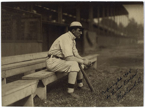 Baseball Player sitting on a bench