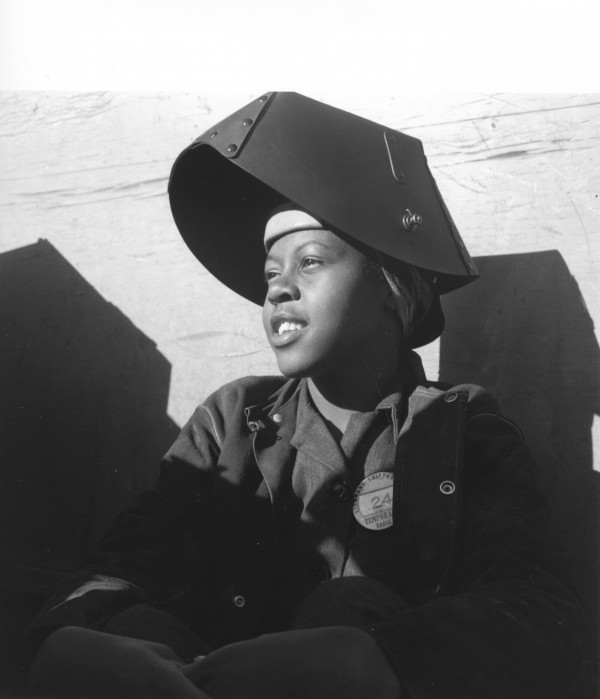 Black woman wearing welding mask. Shipyard worker - 1943 by Dorothea Lang