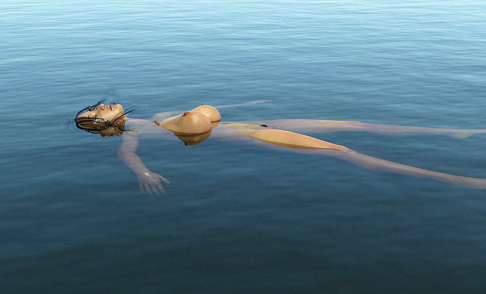 Naked woman floating on water, tits sticking out of the water